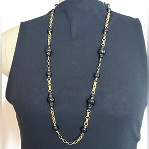 Elegant Gold and Black Necklace